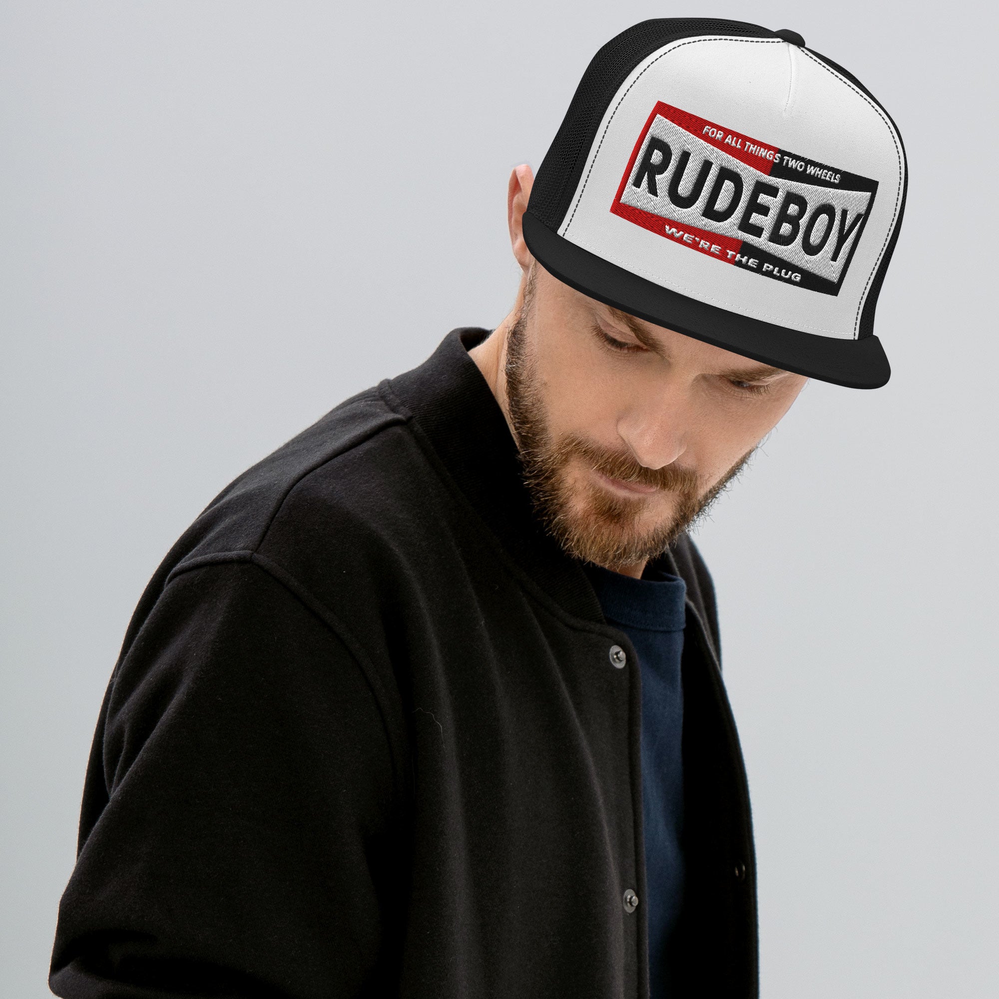 The plug flat brim trucker hat from Rudeboy Cycle’s Golden Era collection 