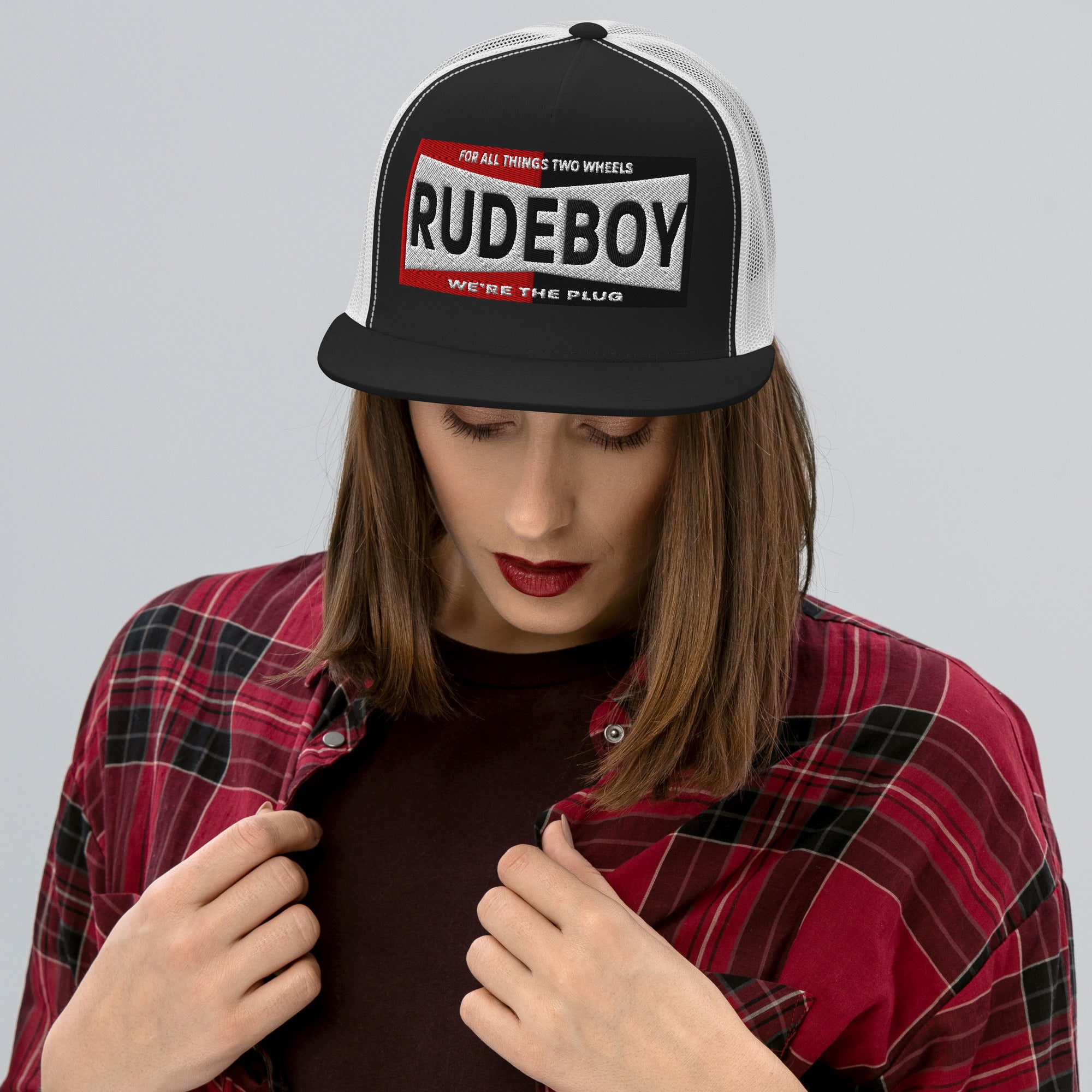 The plug flat brim trucker hat from Rudeboy Cycle’s Golden Era collection 