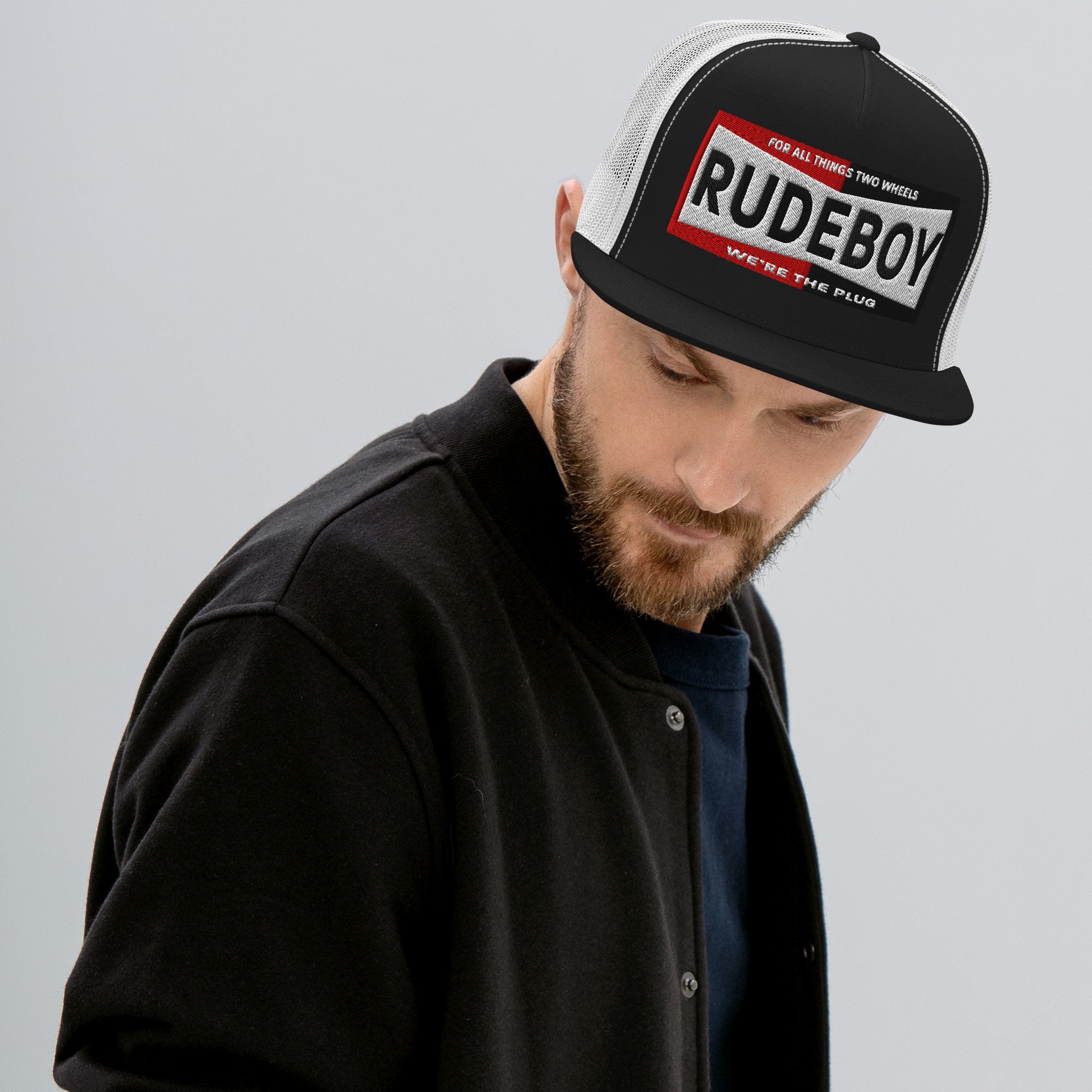 The plug flat brim trucker hat from Rudeboy Cycle’s Golden Era collection 