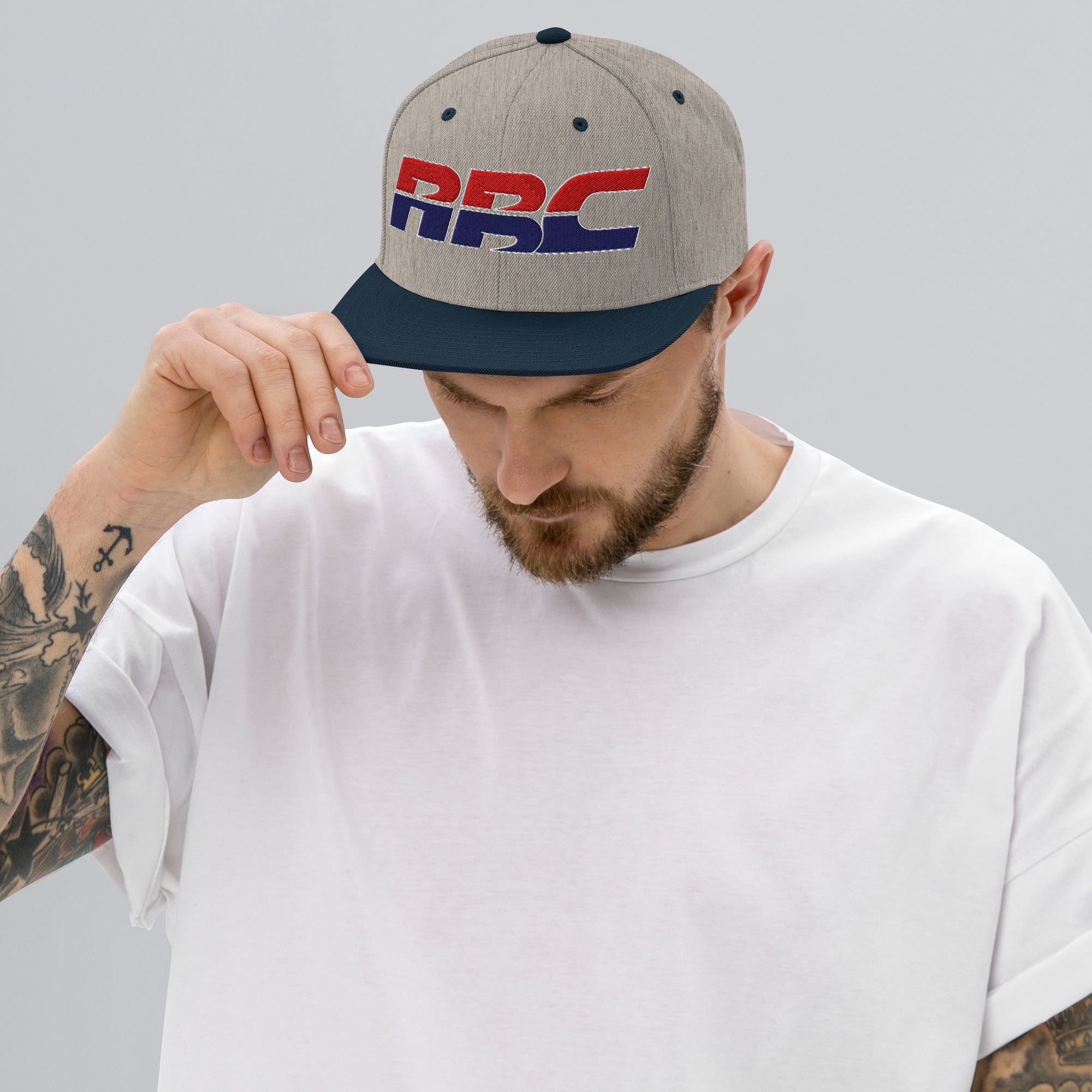 Our flip of the HRC logo is part of the golden era
Collection. Flat brim SnapBack from Rudeboy Cycles 