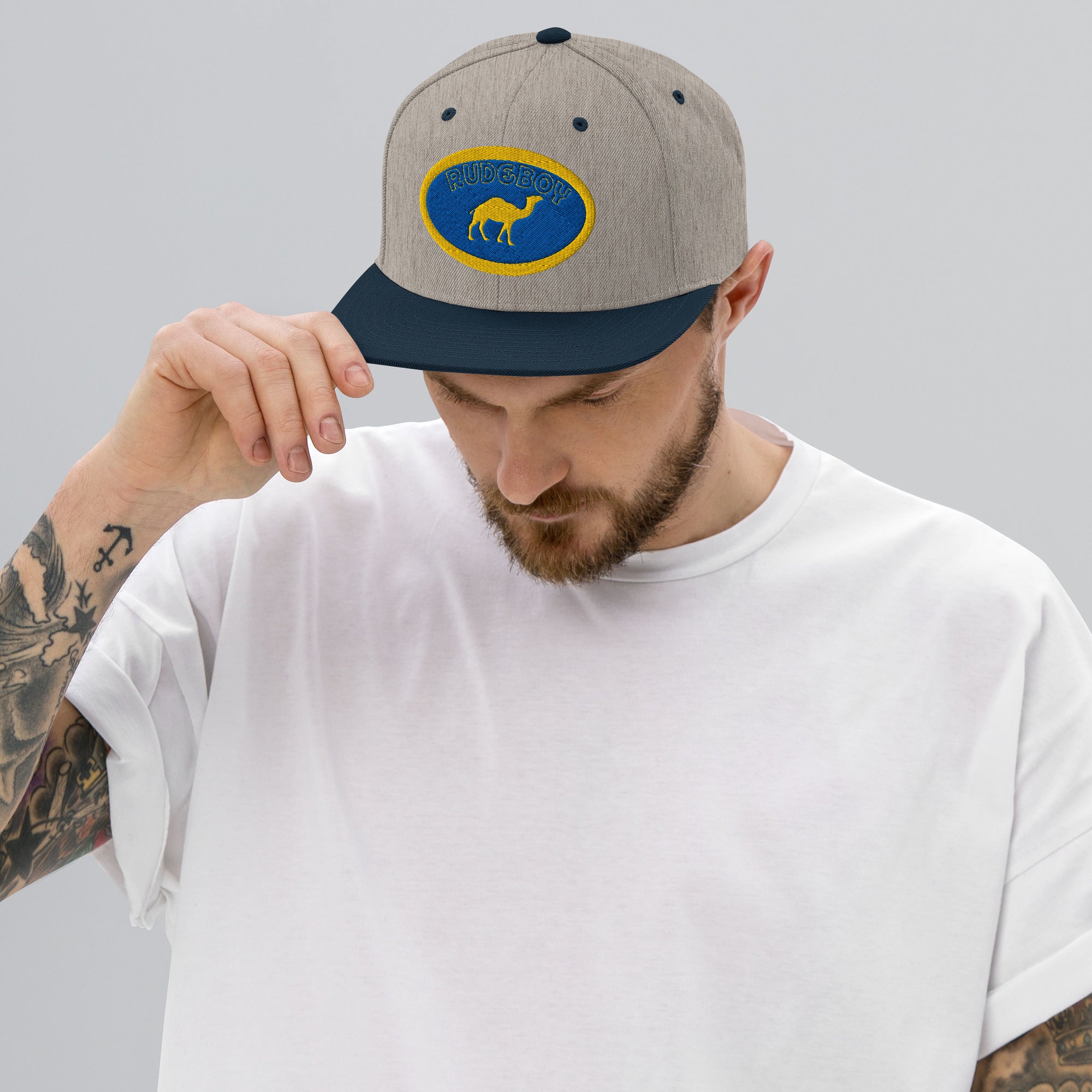 Single hump flat brim snap back hat from Rudeboy Cycle’s Golden Era collection 