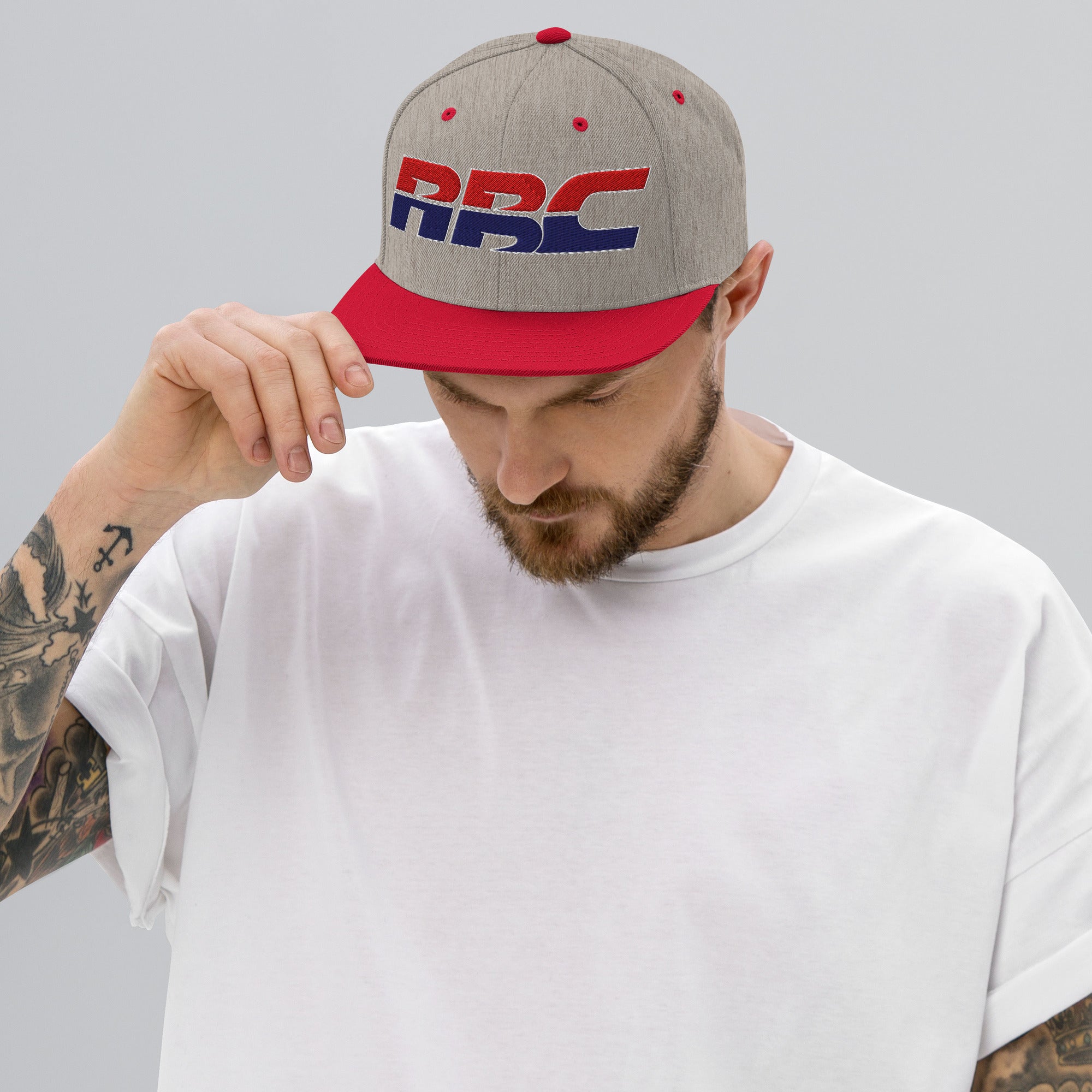 Our flip of the HRC logo is part of the golden era
Collection. Flat brim SnapBack from Rudeboy Cycles 