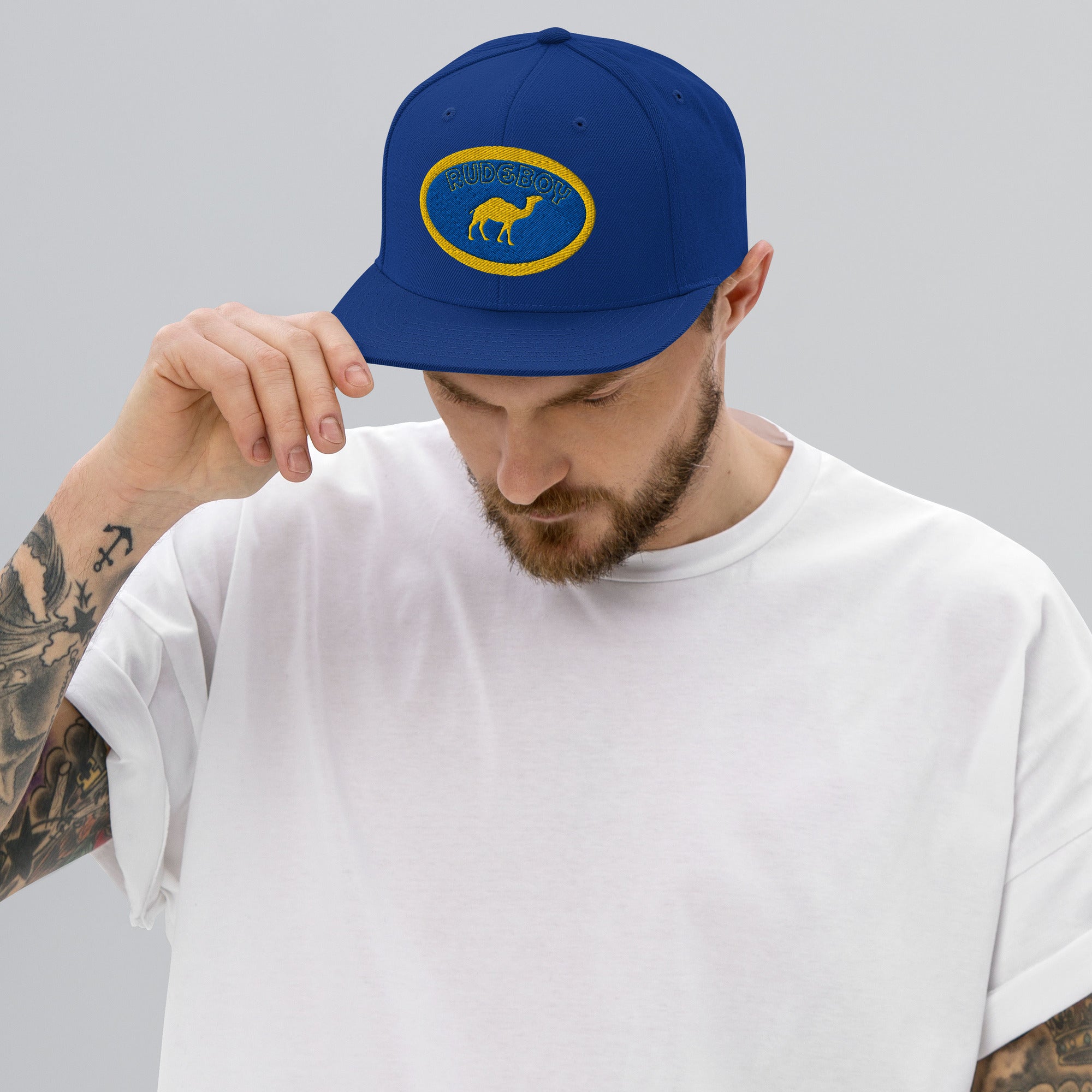 Single hump flat brim snap back hat from Rudeboy Cycle’s Golden Era collection 
 