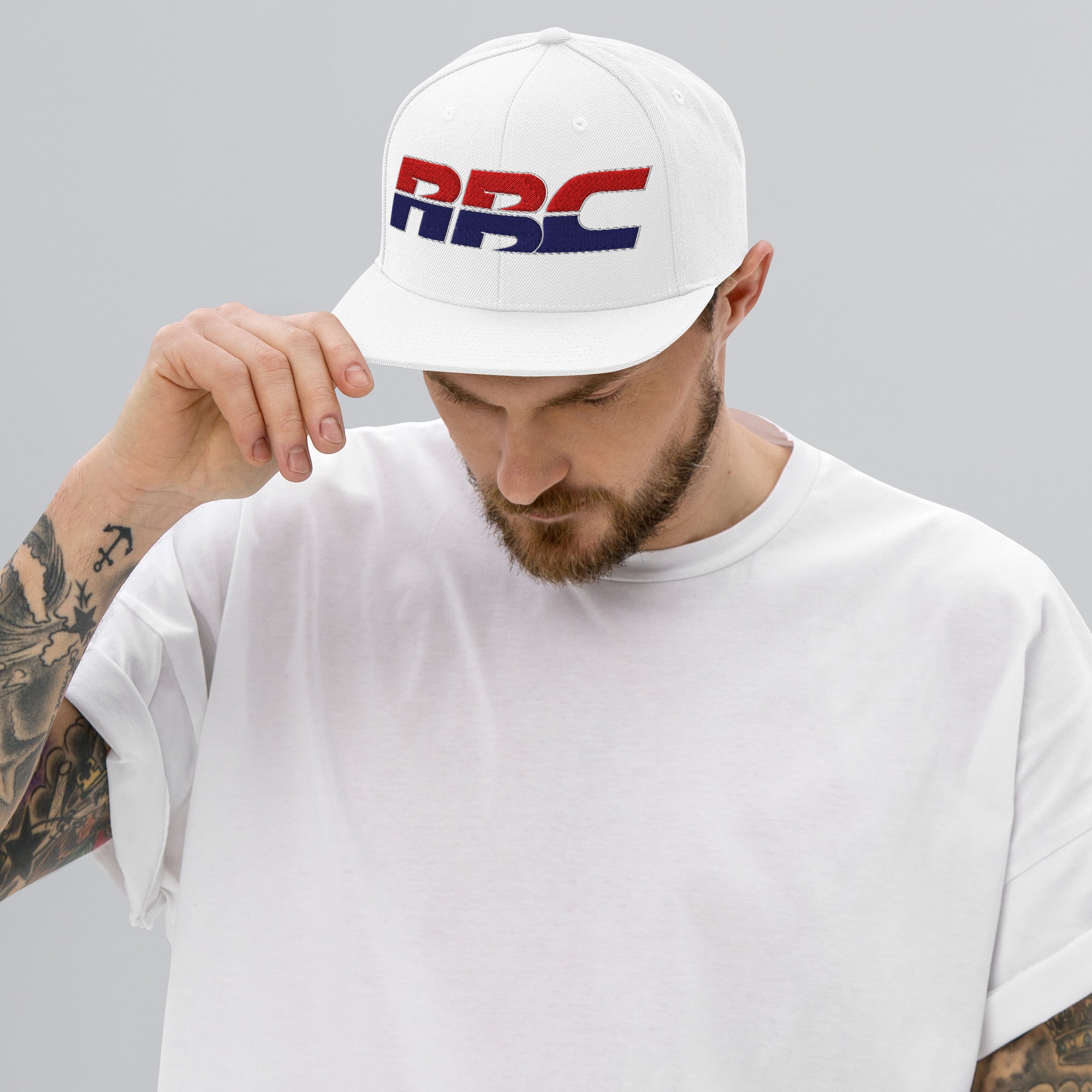 Our flip of the HRC logo is part of the golden era
Collection. Flat brim SnapBack from Rudeboy Cycles 